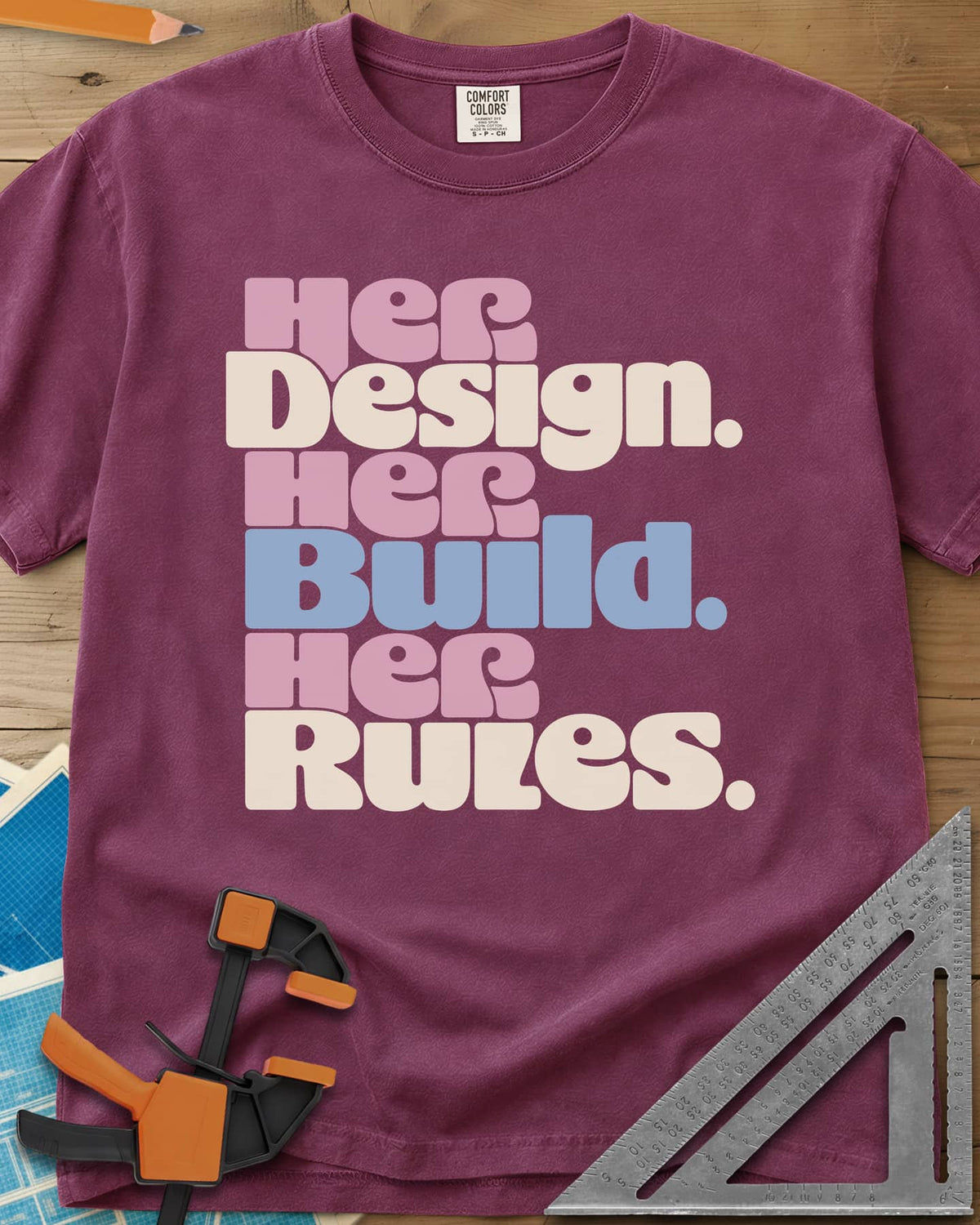 Her Rules heavyweight tee in Berry, three stacked lines of rounded retro lettering