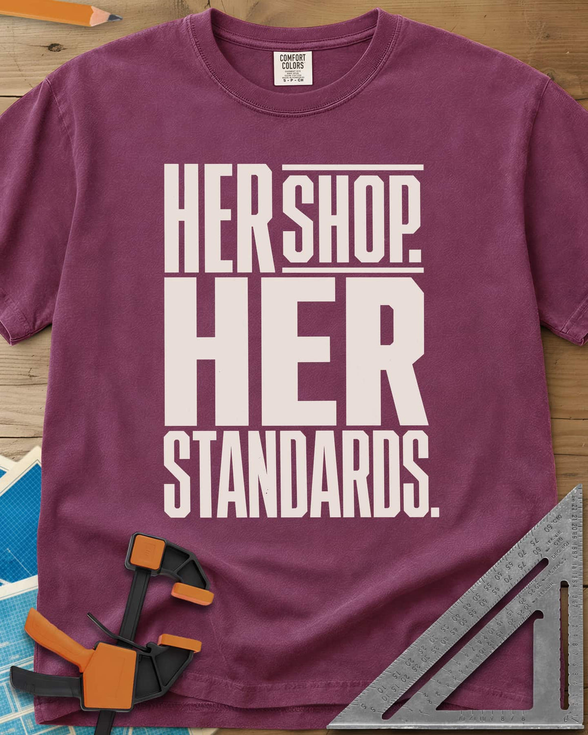 Her Shop heavyweight tee in Berry, tall block capitals with SHOP between two pink lines