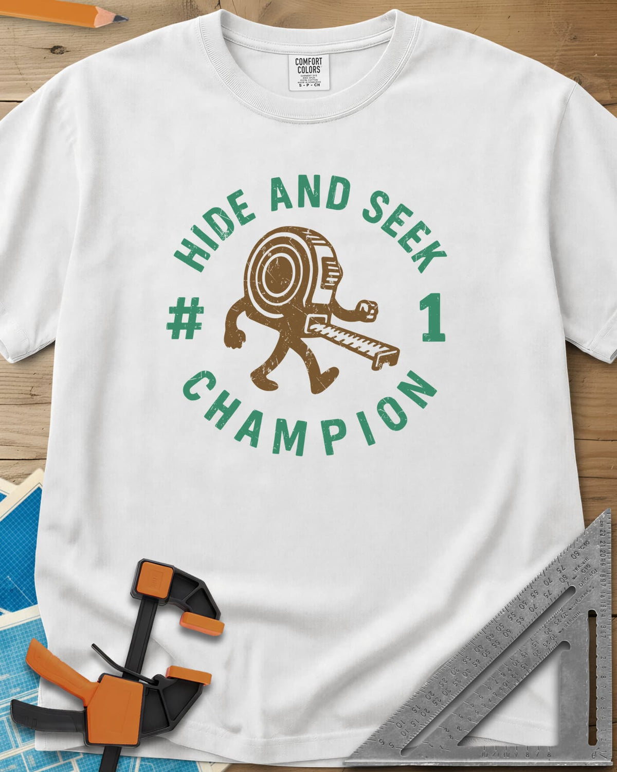 Hide And Seek heavyweight tee in White, a walking tape measure character inside a round badge