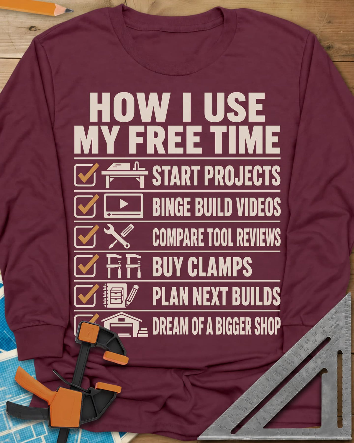 How I Use My Free Time long sleeve shirt in Maroon, six-line checklist, each tick beside a tiny icon