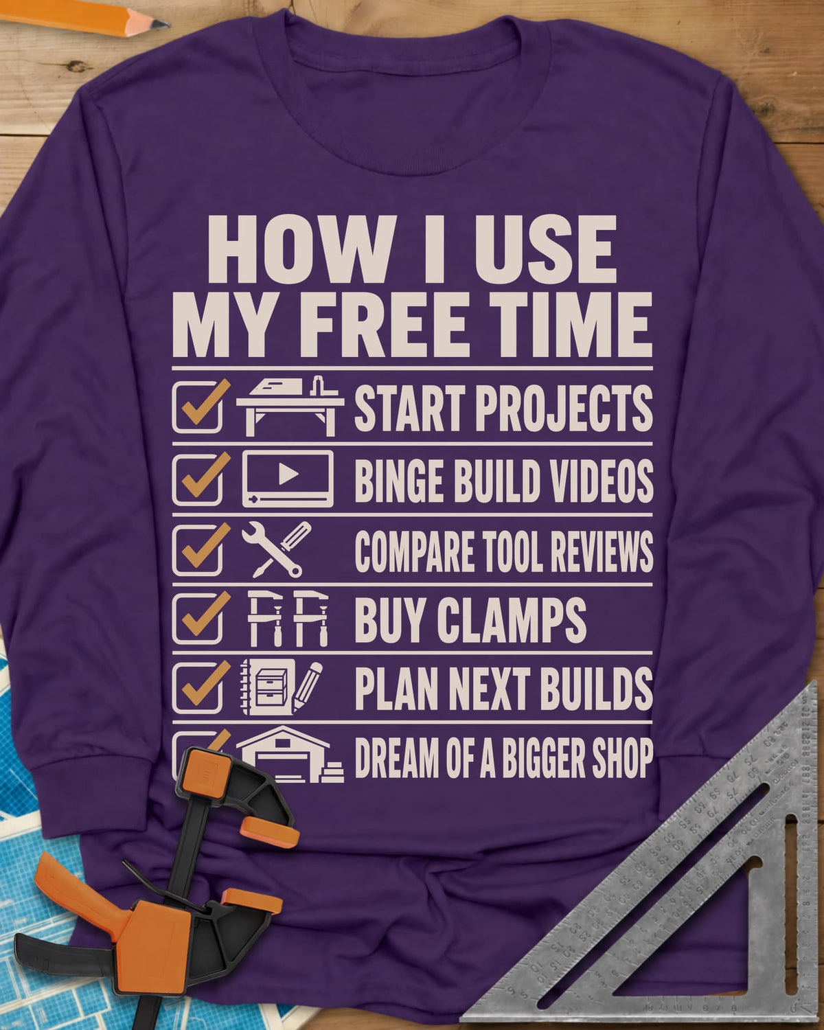 How I Use My Free Time long sleeve shirt in Purple, six-line checklist, each tick beside a tiny icon