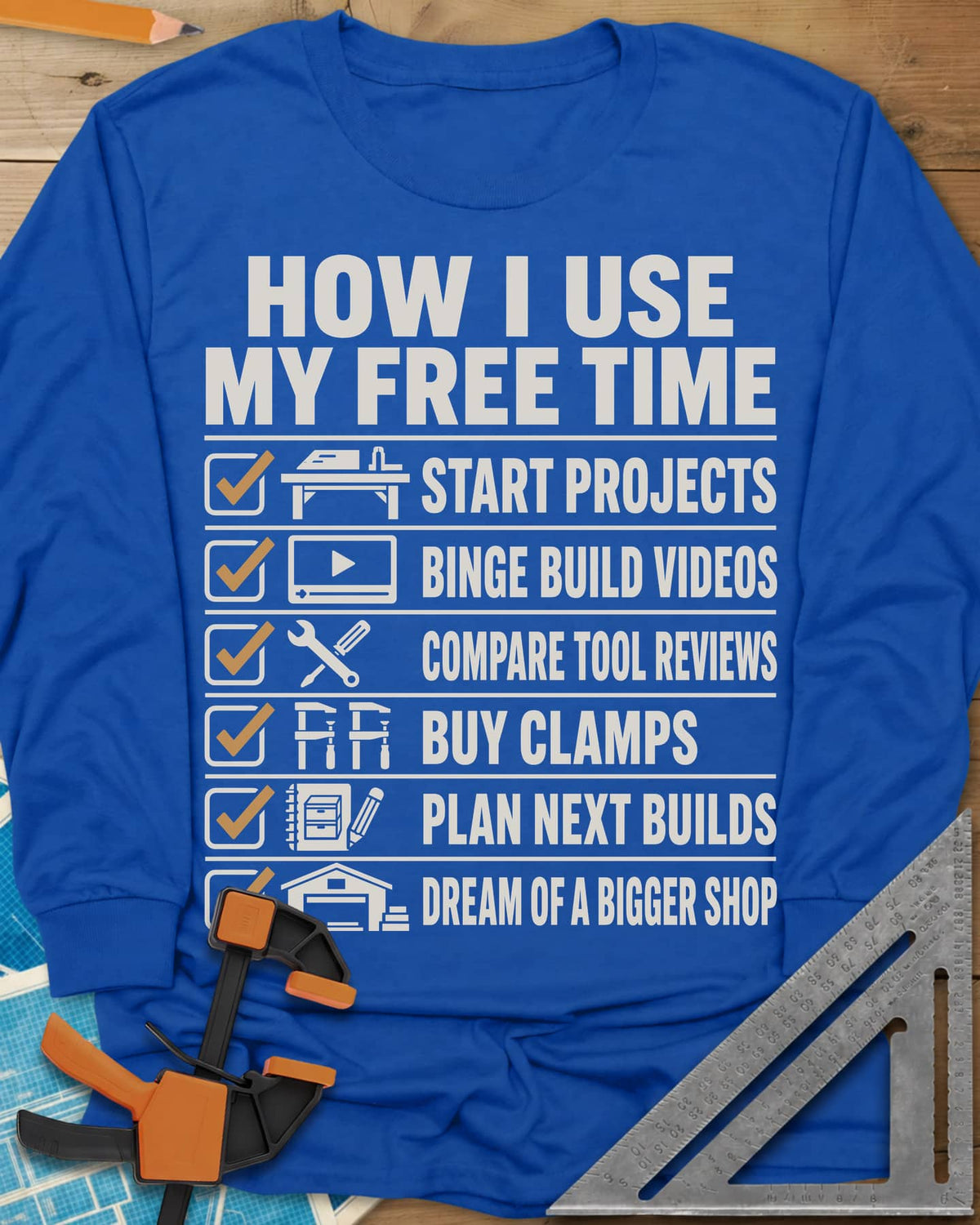 How I Use My Free Time long sleeve shirt in Royal, six-line checklist, each tick beside a tiny icon