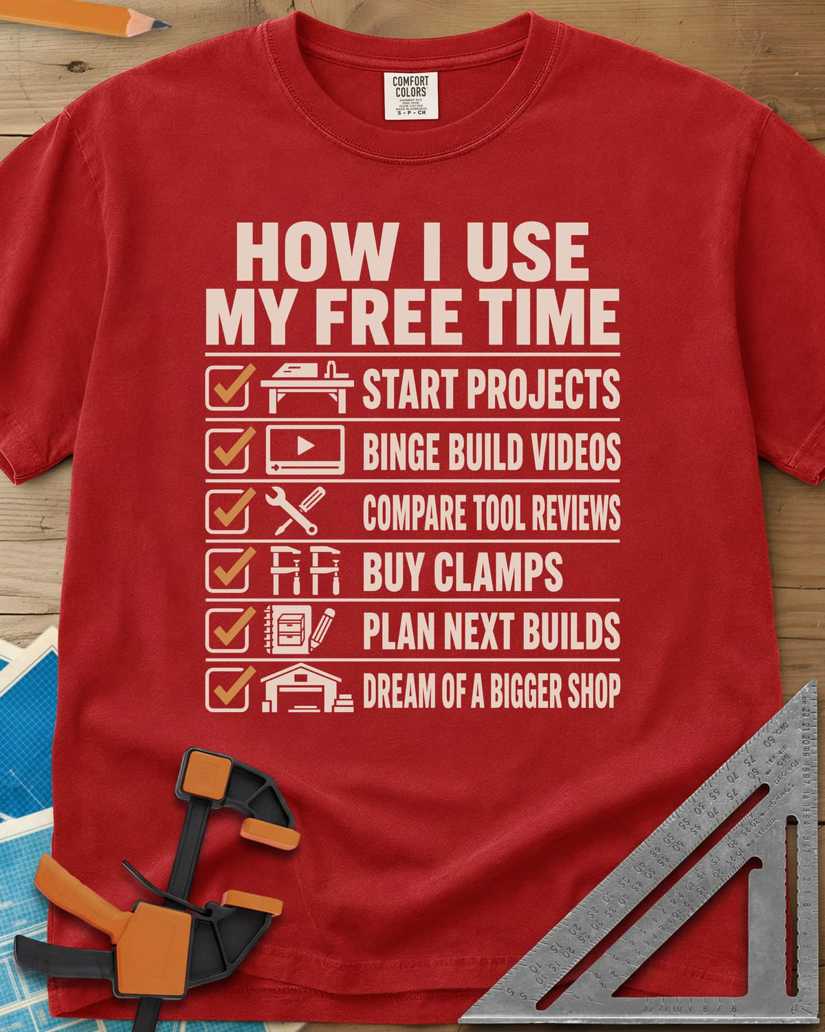 How I Use My Free Time heavyweight tee in Red, six-line checklist, each tick beside a tiny icon