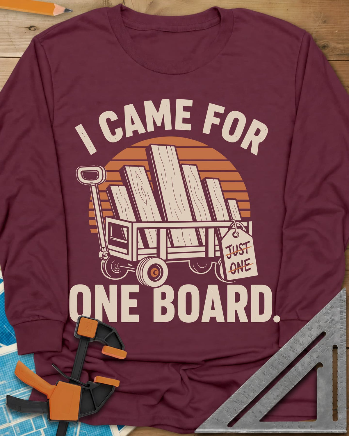 I Came For One Board long sleeve shirt in Maroon, a wagon stacked with boards and a struck-out JUST ONE tag