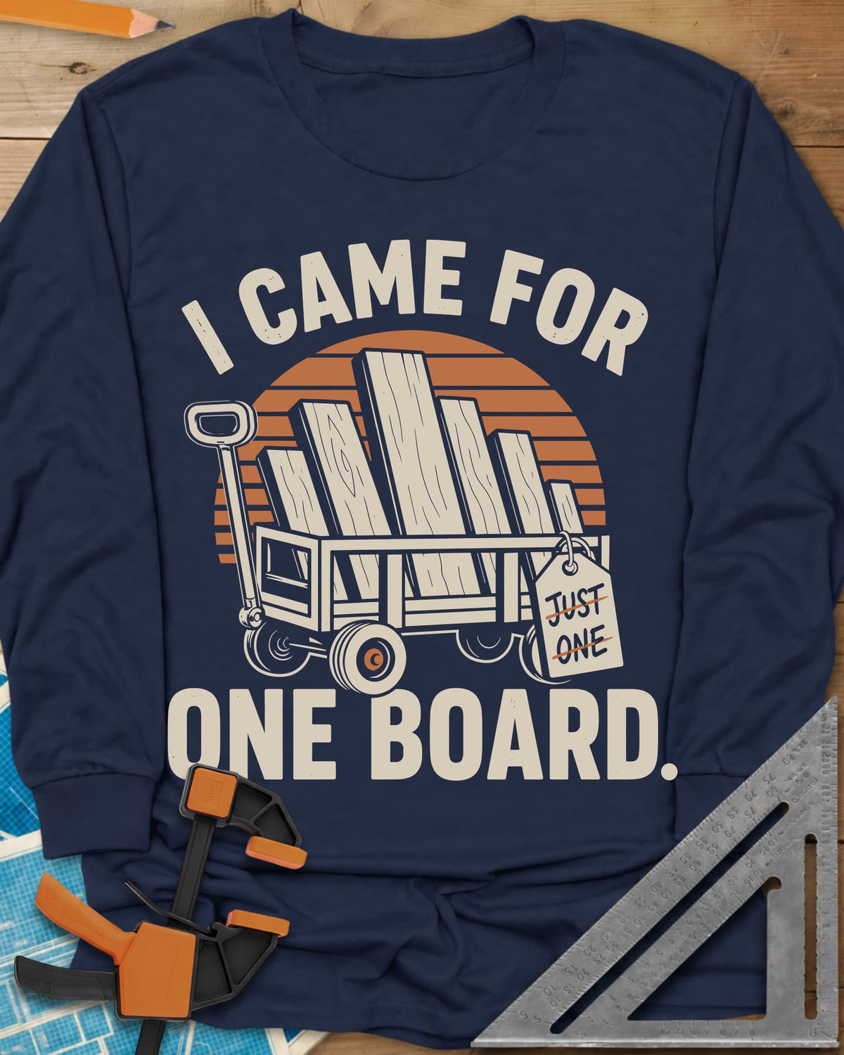 I Came For One Board long sleeve shirt in Navy, a wagon stacked with boards and a struck-out JUST ONE tag