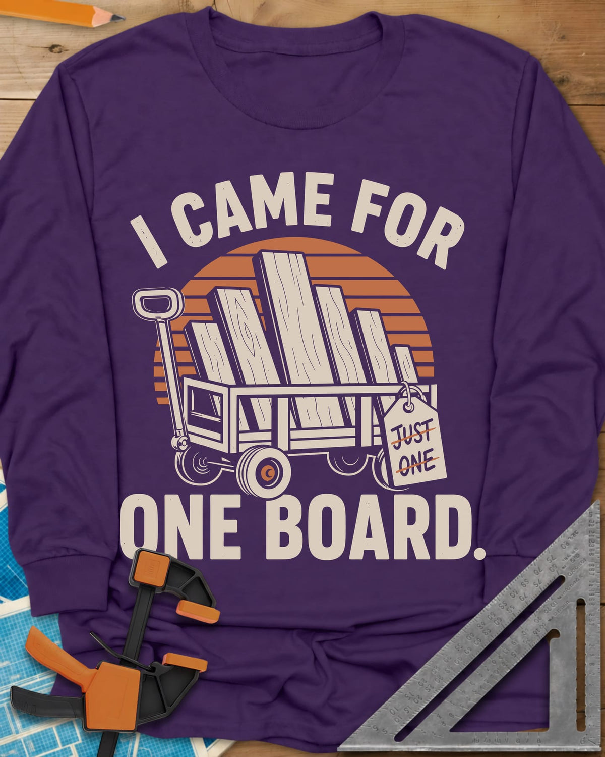 I Came For One Board long sleeve shirt in Purple, a wagon stacked with boards and a struck-out JUST ONE tag