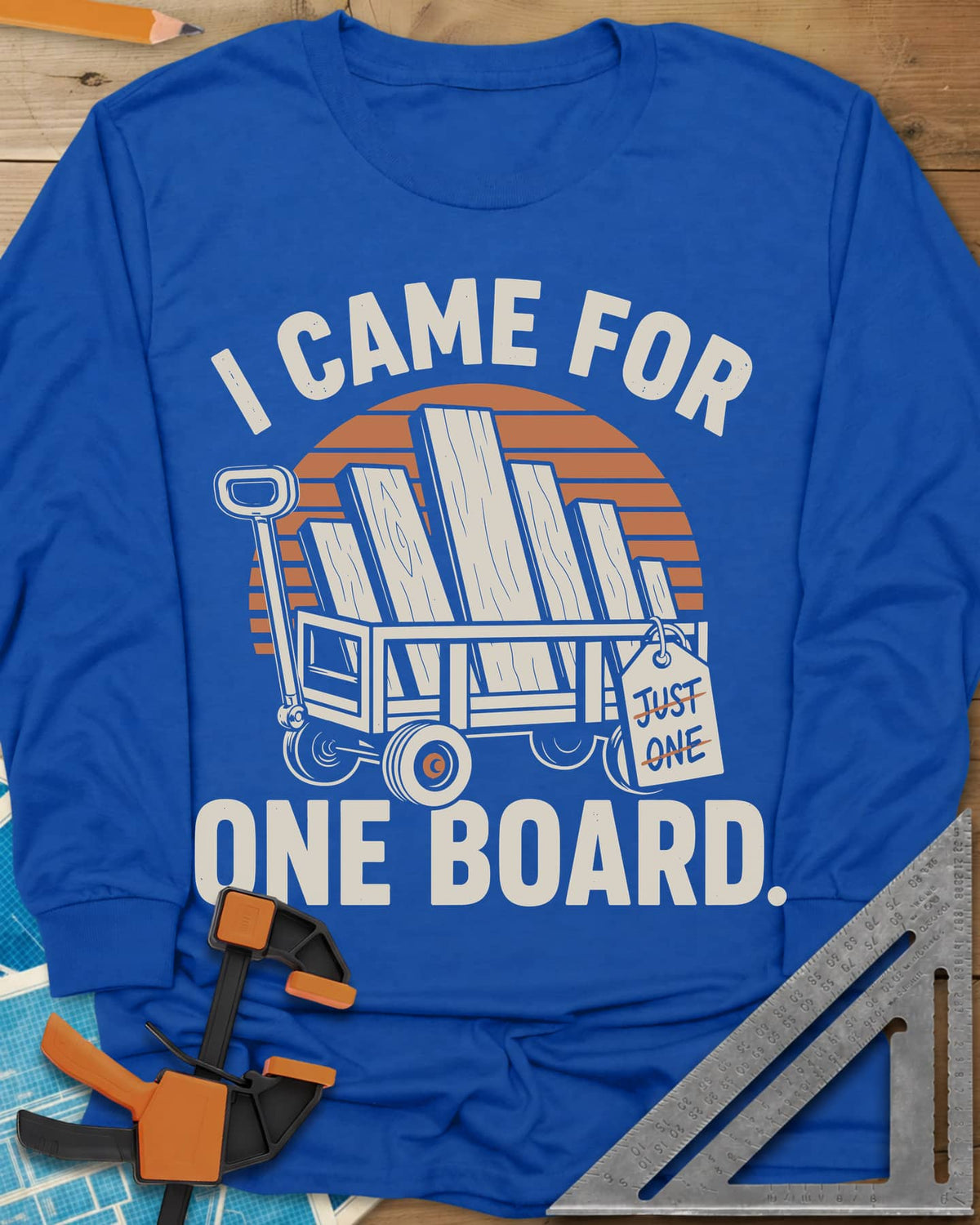 I Came For One Board long sleeve shirt in Royal, a wagon stacked with boards and a struck-out JUST ONE tag