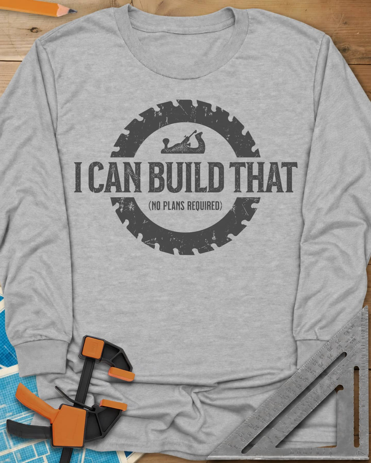 I Can Build That long sleeve shirt in Sport Grey, distressed lettering in a saw blade ring with a small hand plane