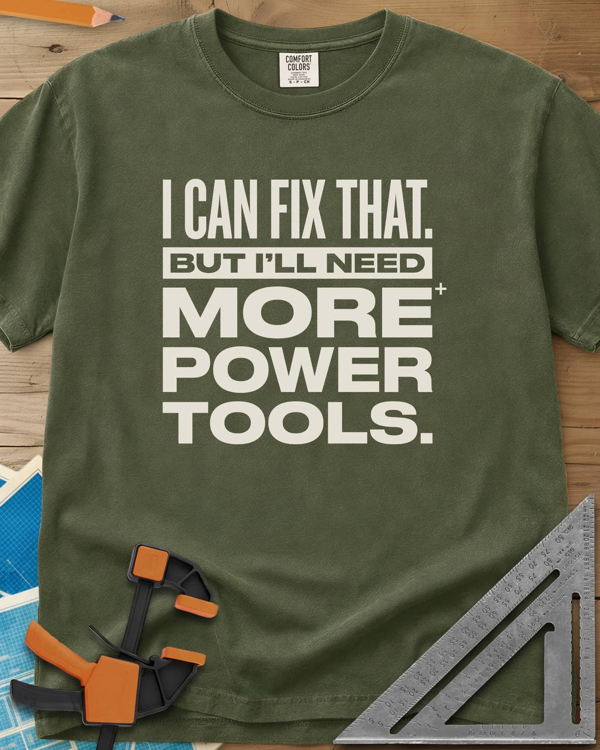 I Can Fix That heavyweight tee in Hemp, stacked bold lettering with one line reversed out of a bar