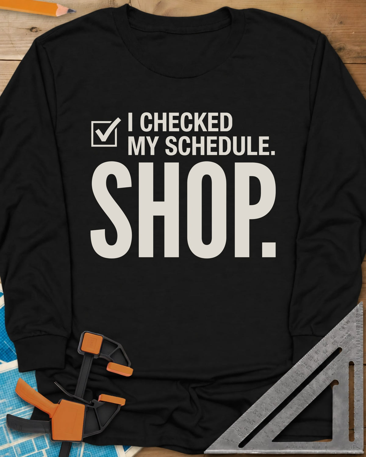 I Checked My Schedule Shop long sleeve shirt in Black, a checked box beside small text and a huge SHOP below
