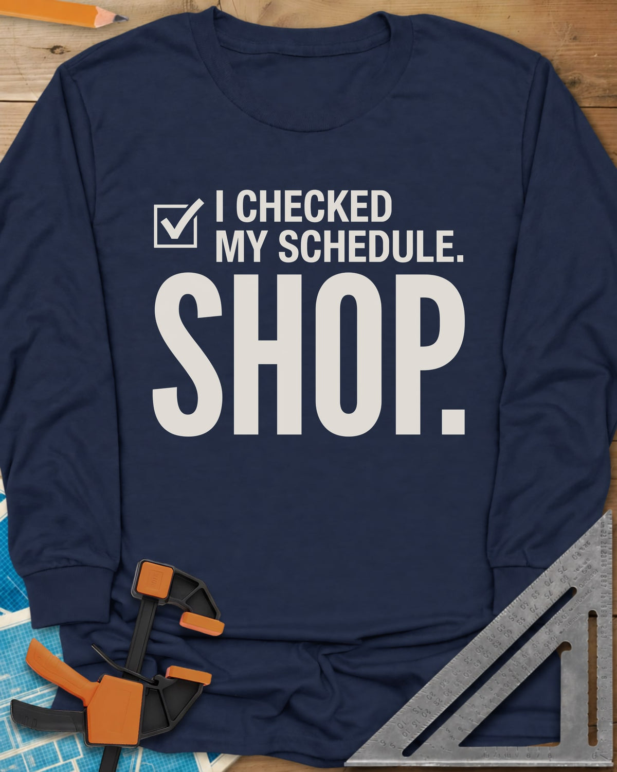 I Checked My Schedule Shop long sleeve shirt in Navy, a checked box beside small text and a huge SHOP below