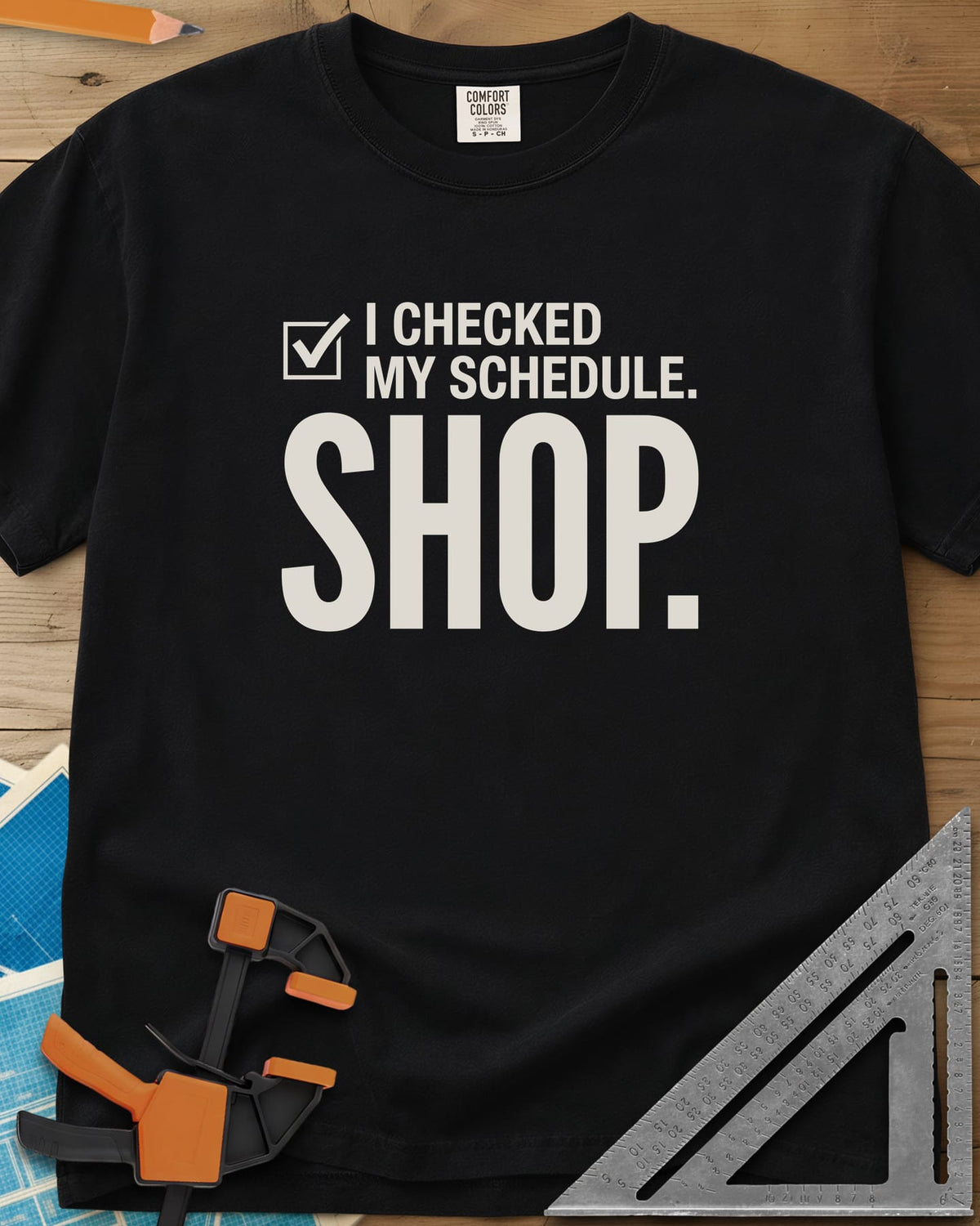 I Checked My Schedule Shop heavyweight tee in Black, a checked box beside small text and a huge SHOP below