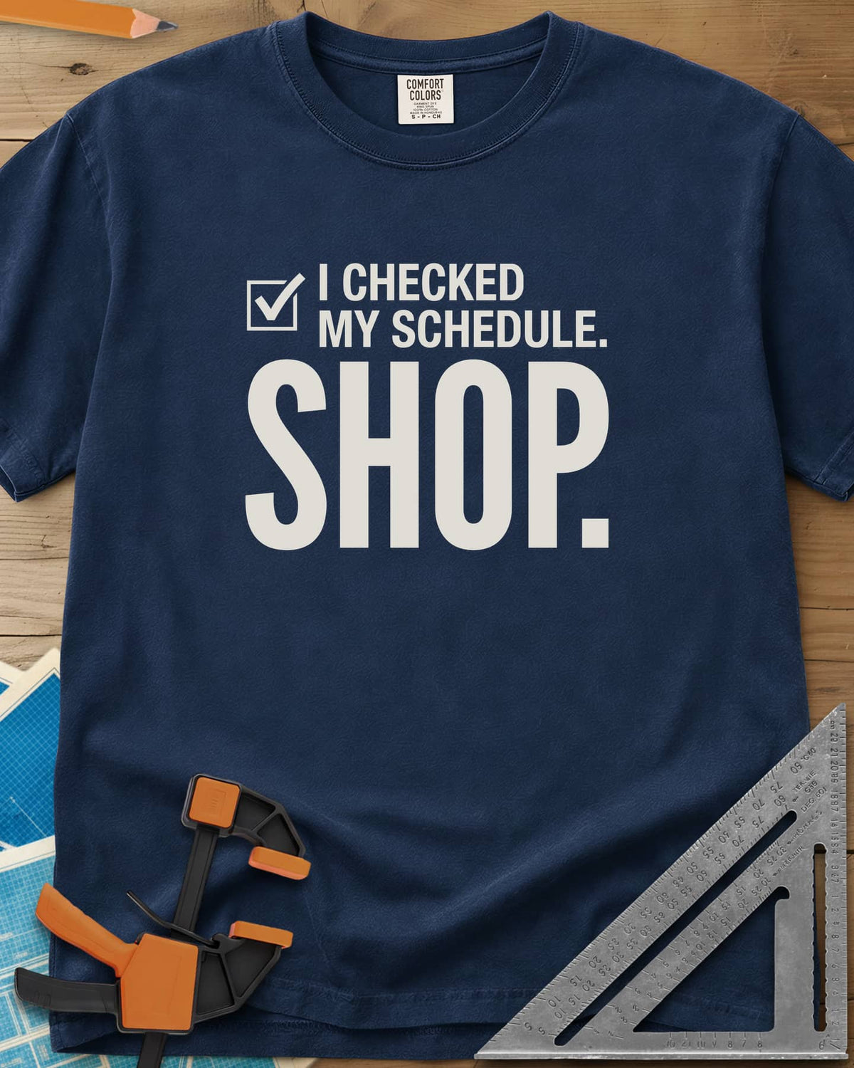 I Checked My Schedule Shop heavyweight tee in Navy, a checked box beside small text and a huge SHOP below