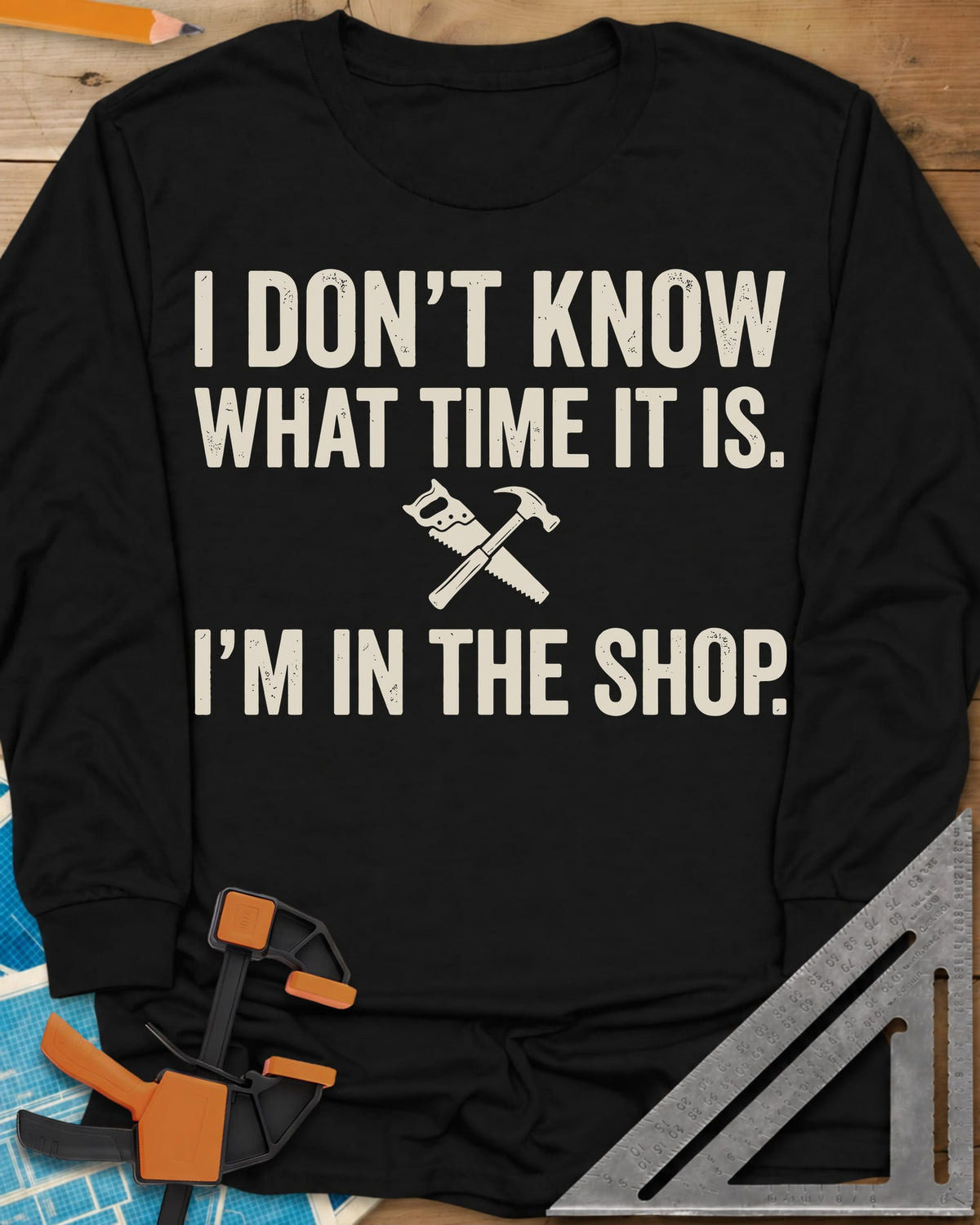 I Don't Know What Time It Is long sleeve shirt in Black, a small crossed handsaw and hammer between two lines of text