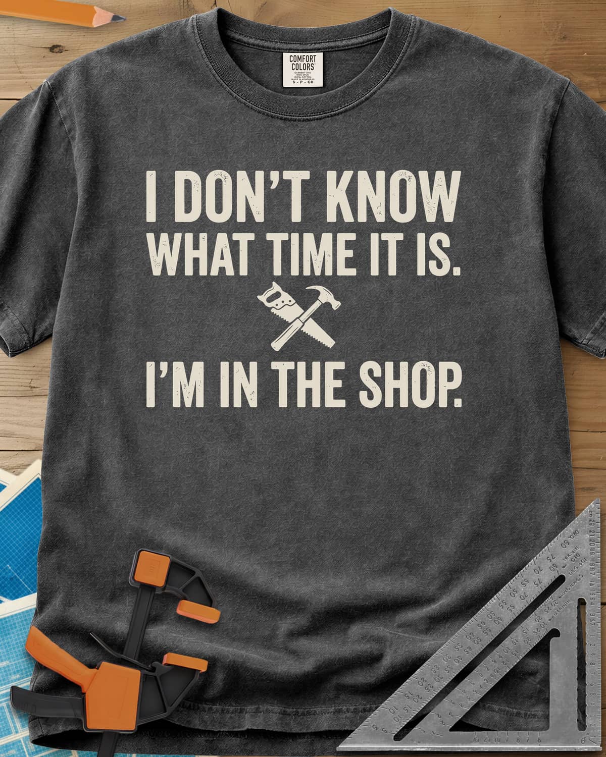 I Don't Know What Time It Is heavyweight tee in Pepper, a small crossed handsaw and hammer between two lines of text