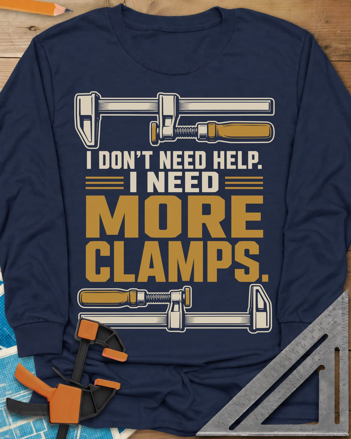 I Don't Need Help I Need More Clamps long sleeve shirt in Navy, two bar clamps above and below bold stacked lettering