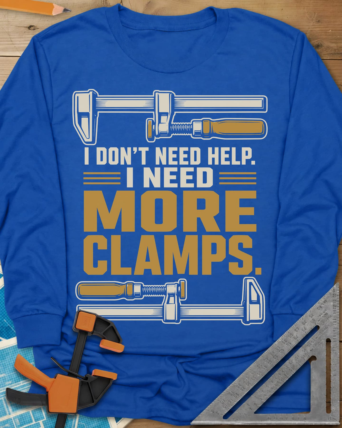 I Don't Need Help I Need More Clamps long sleeve shirt in Royal, two bar clamps above and below bold stacked lettering