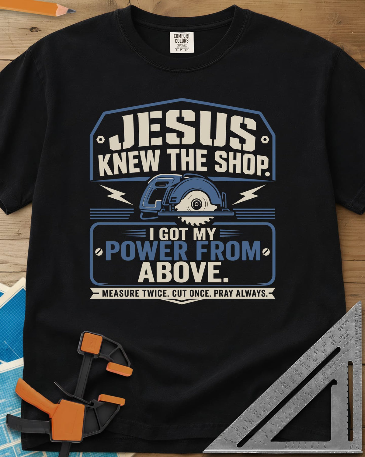 I Got My Power From Above heavyweight tee in Black, a blue circular saw with lightning bolts in a badge