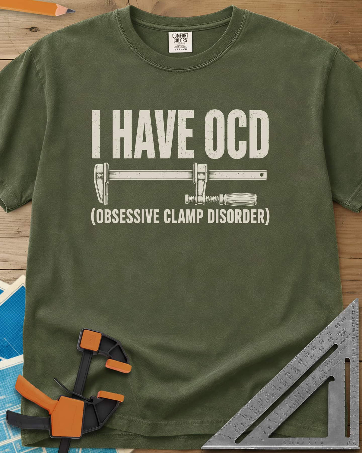 I Have OCD heavyweight tee in Hemp, long bar clamp drawn between the headline and its explanation