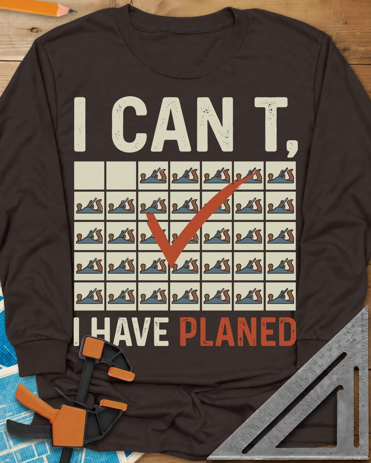 I Have Planed long sleeve shirt in Dark Chocolate, a calendar grid of hand planes with one red check mark