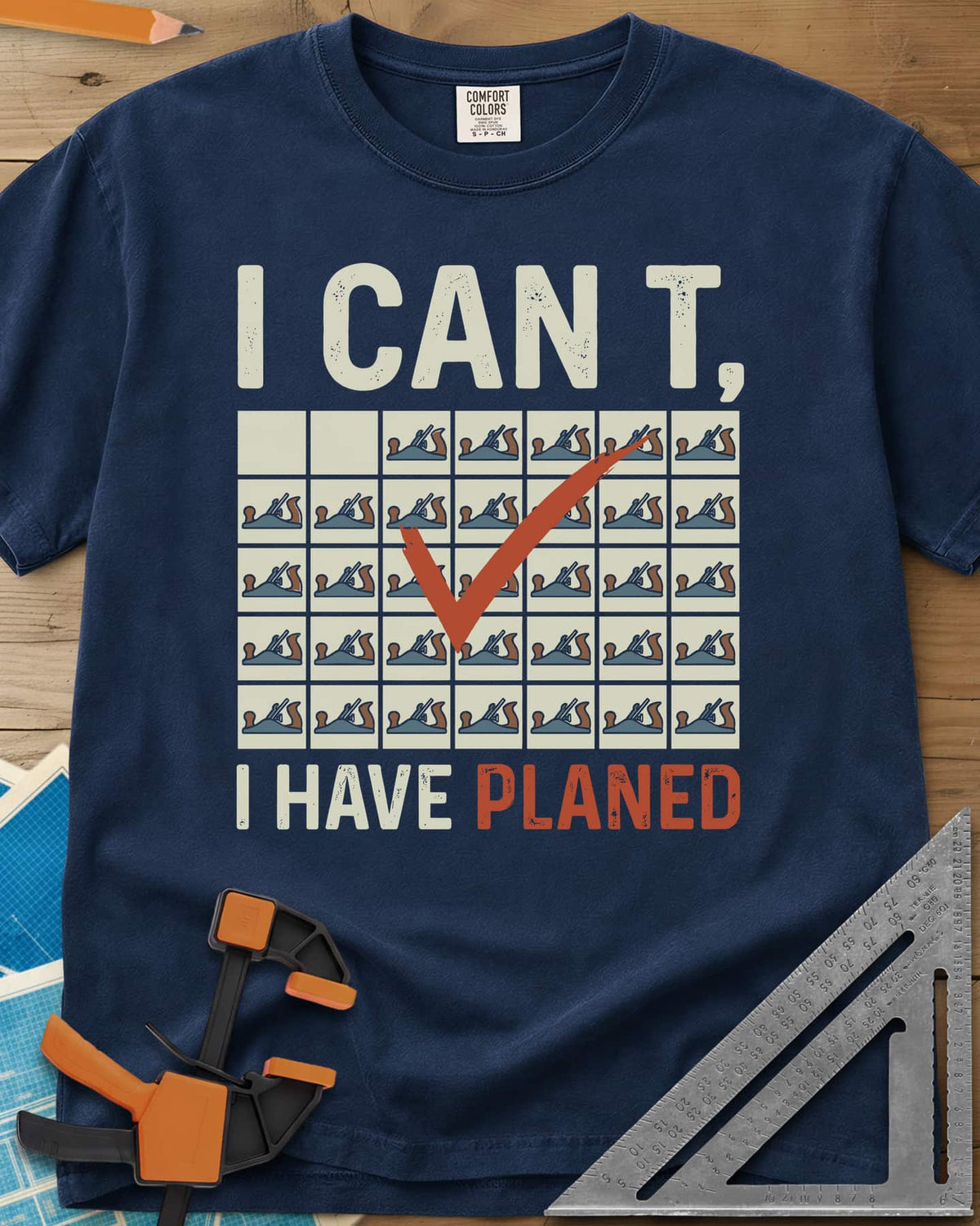 I Have Planed heavyweight tee in Navy, a calendar grid of hand planes with one red check mark