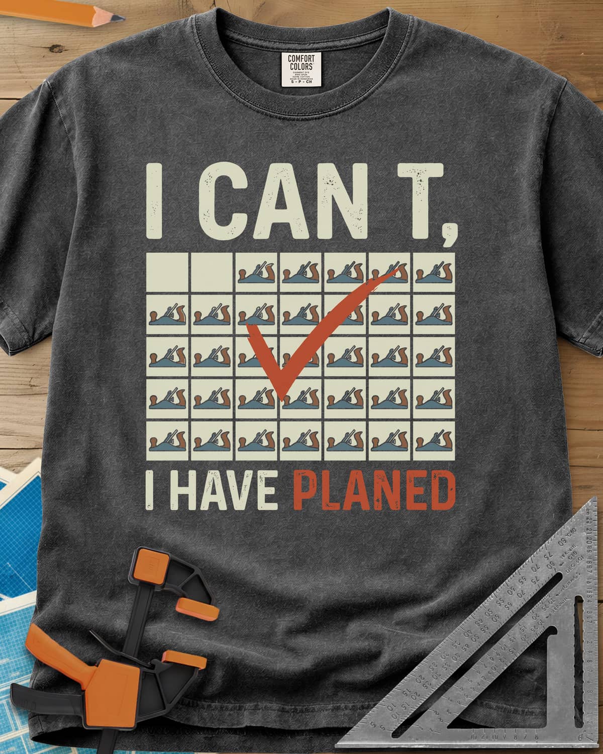 I Have Planed heavyweight tee in Pepper, a calendar grid of hand planes with one red check mark