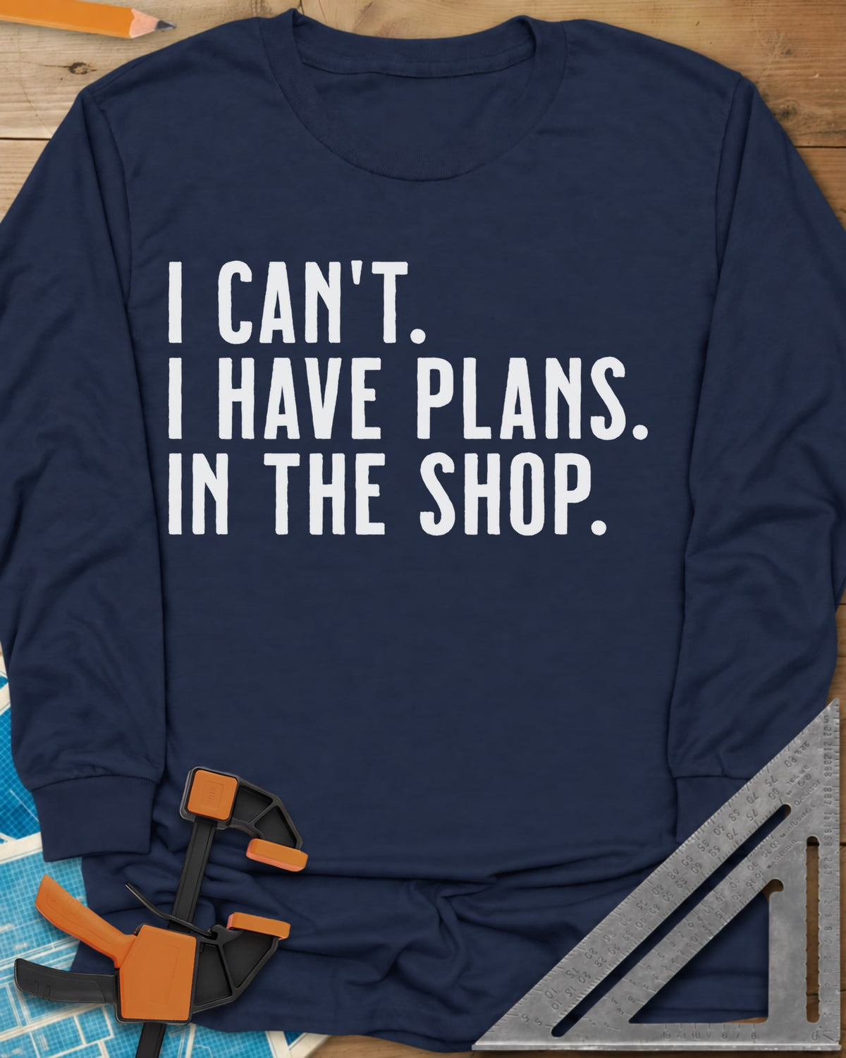 I Have Plans In The Shop long sleeve shirt in Navy, three lines of plain condensed capitals, no graphic