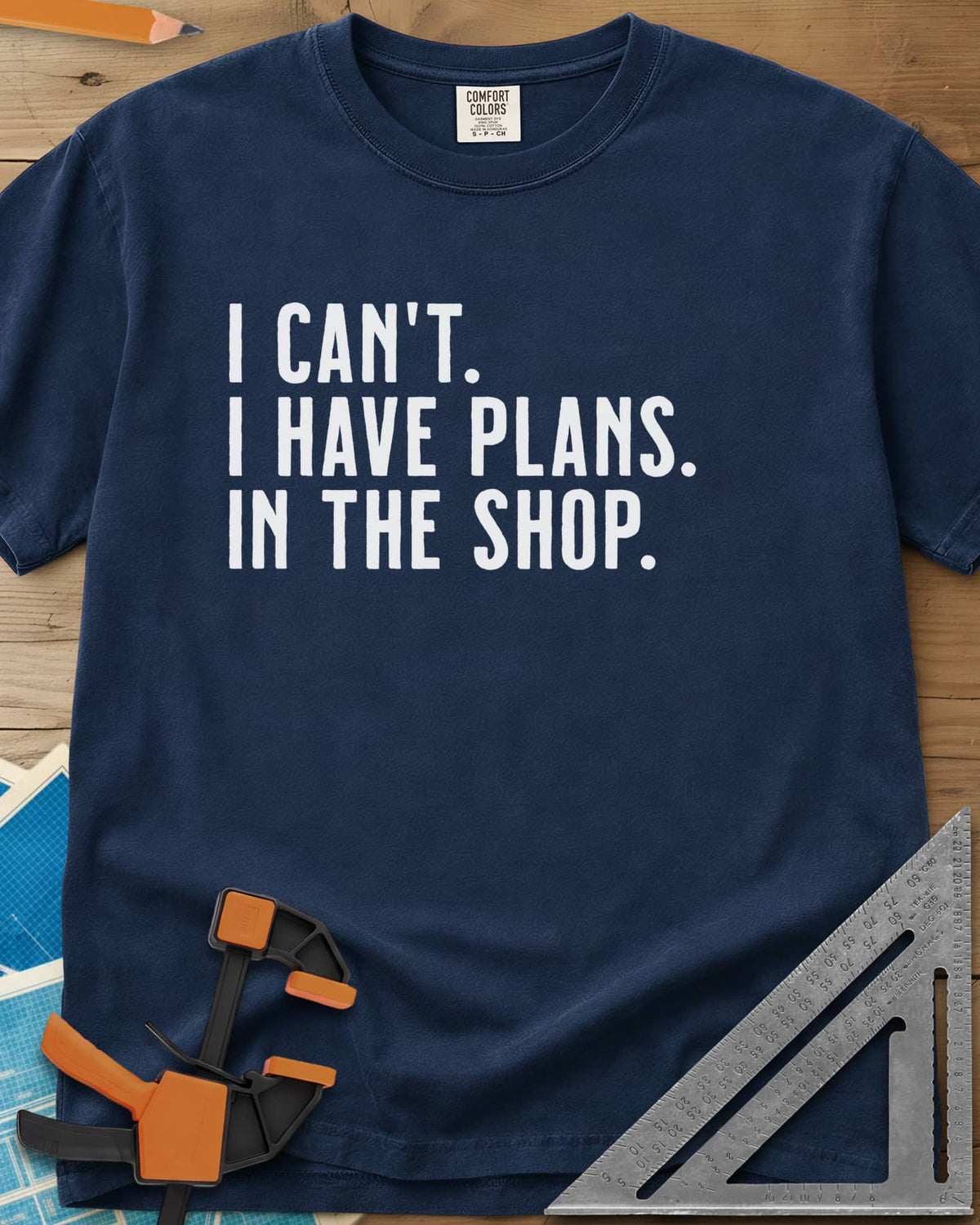 I Have Plans In The Shop heavyweight tee in Navy, three lines of plain condensed capitals, no graphic