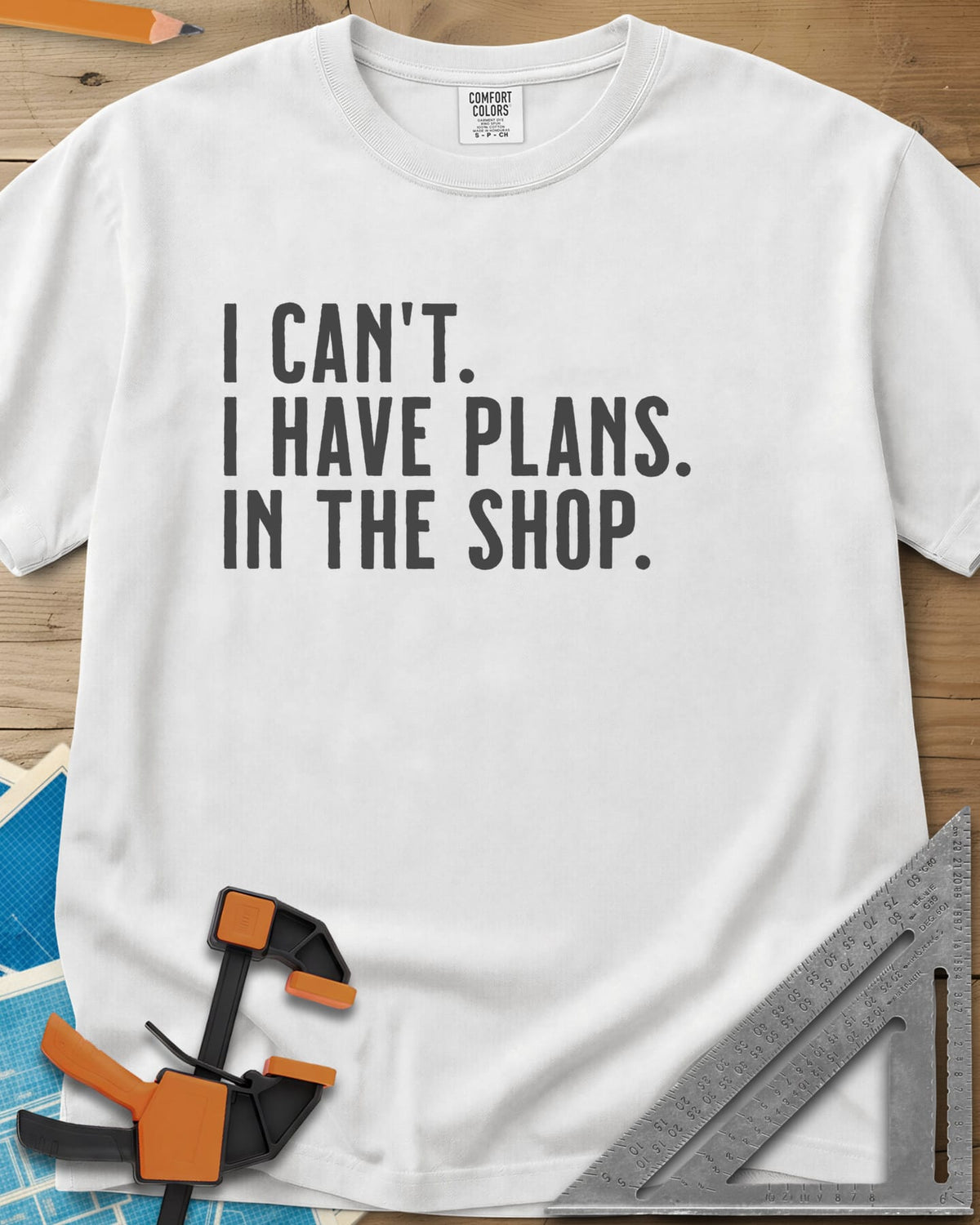 I Have Plans In The Shop heavyweight tee in White, three lines of plain condensed capitals, no graphic