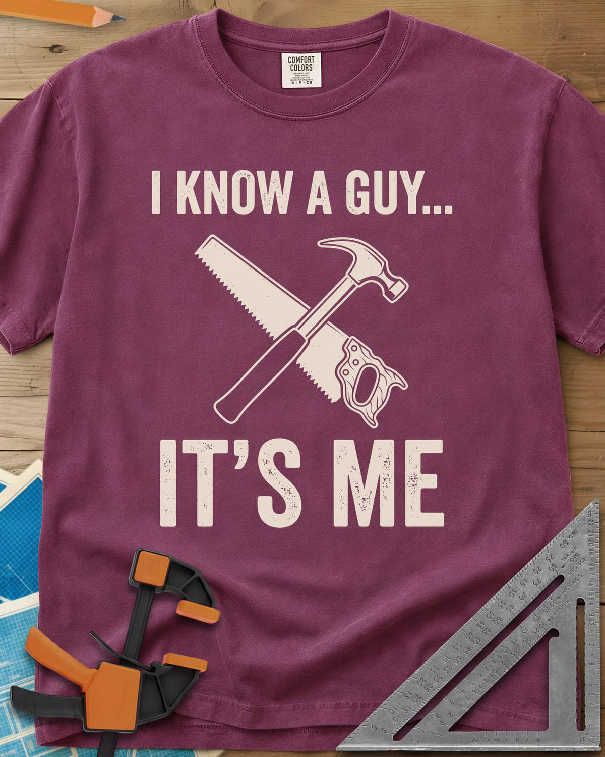 I Know A Guy heavyweight tee in Berry, a crossed claw hammer and handsaw between the two lines
