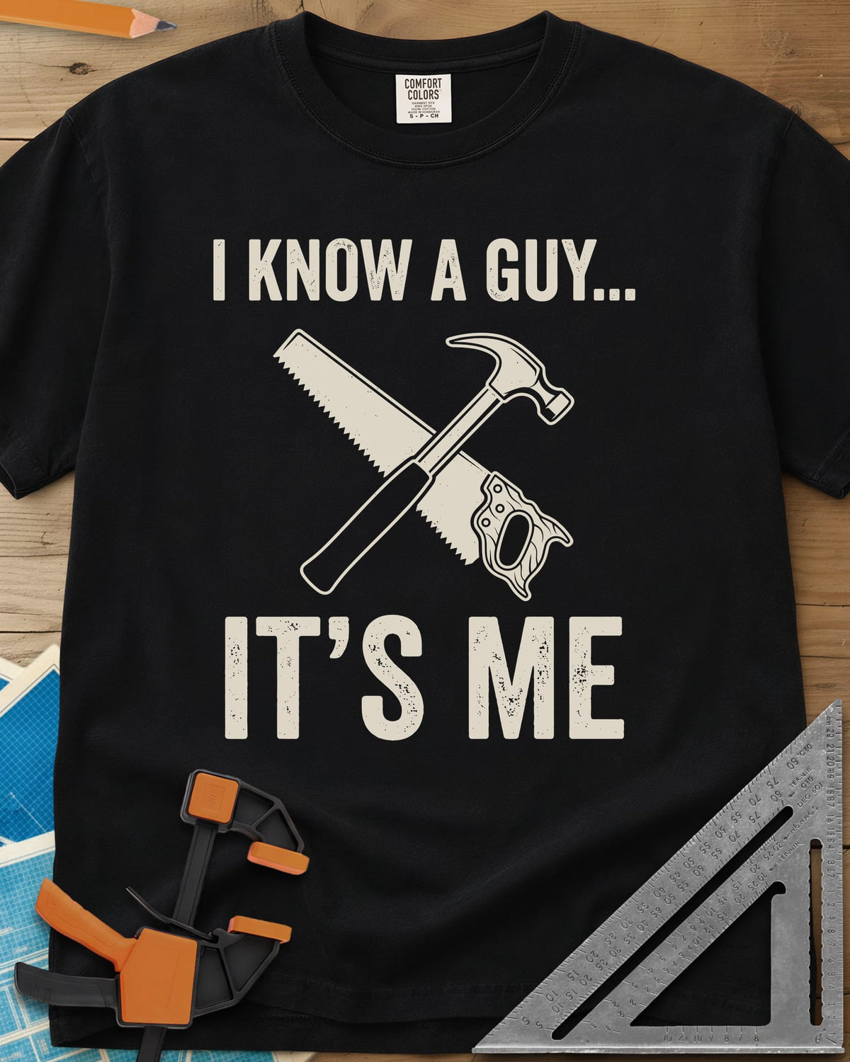 I Know A Guy heavyweight tee in Black, a crossed claw hammer and handsaw between the two lines