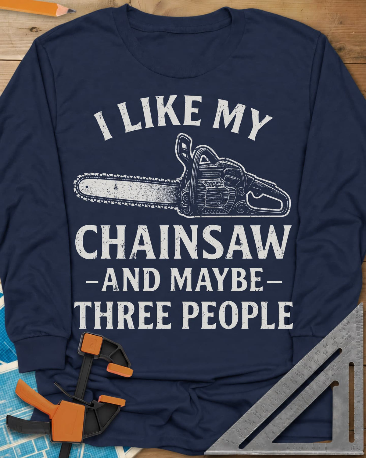 I Like My Chainsaw long sleeve shirt in Navy, distressed chainsaw drawing between the first and second lines