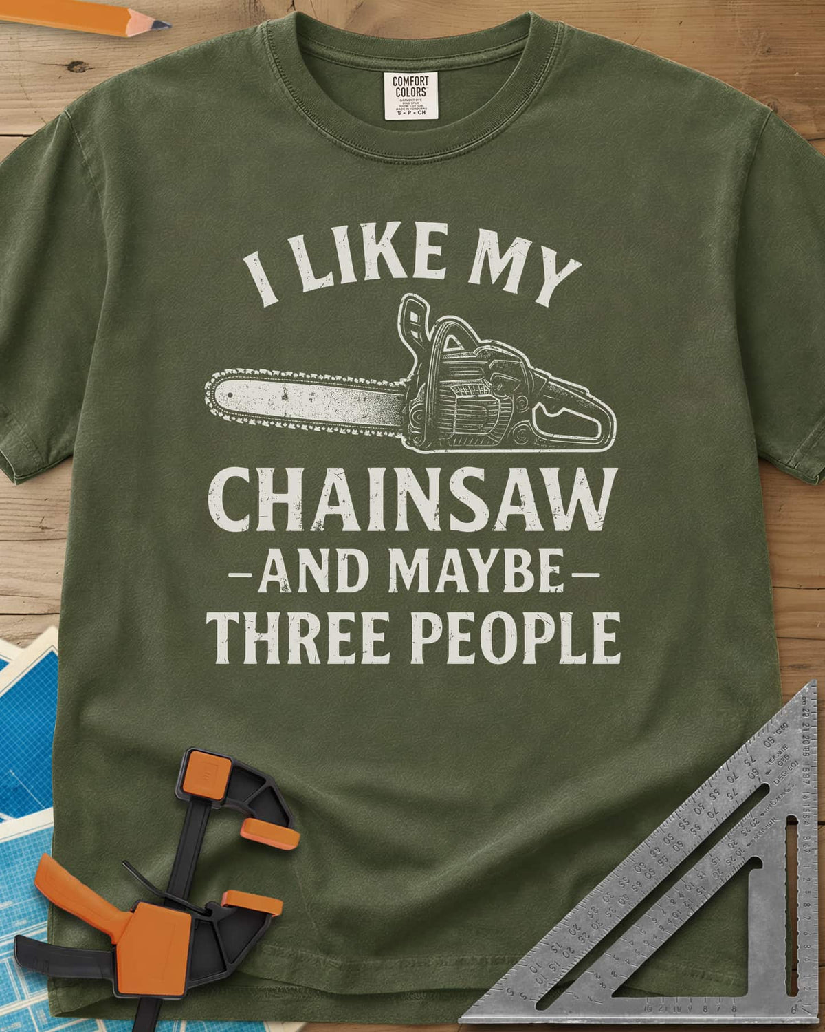 I Like My Chainsaw heavyweight tee in Hemp, distressed chainsaw drawing between the first and second lines