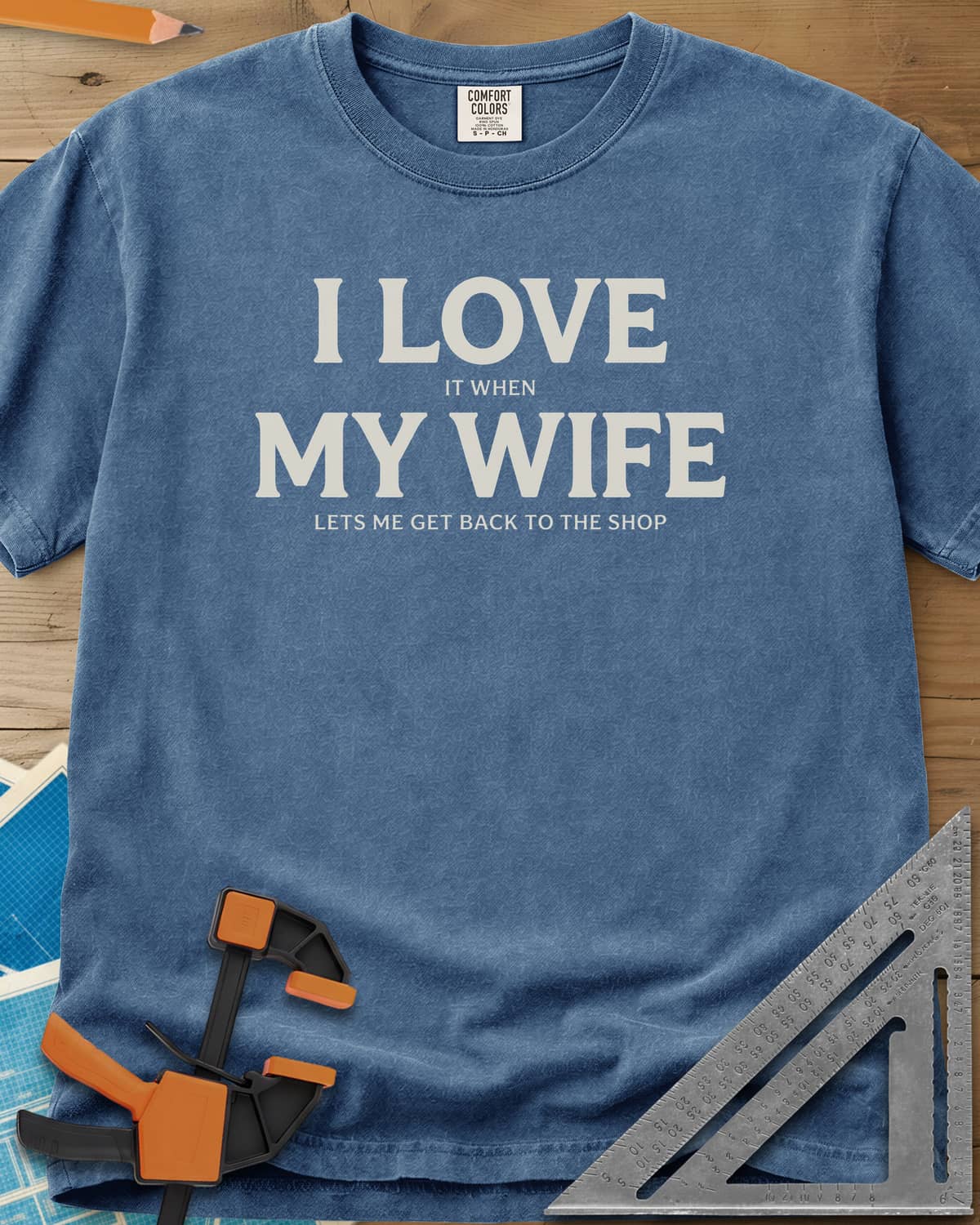I Love My Wife heavyweight tee in Blue Jean, centered serif lettering, big I LOVE and MY WIFE, small words between