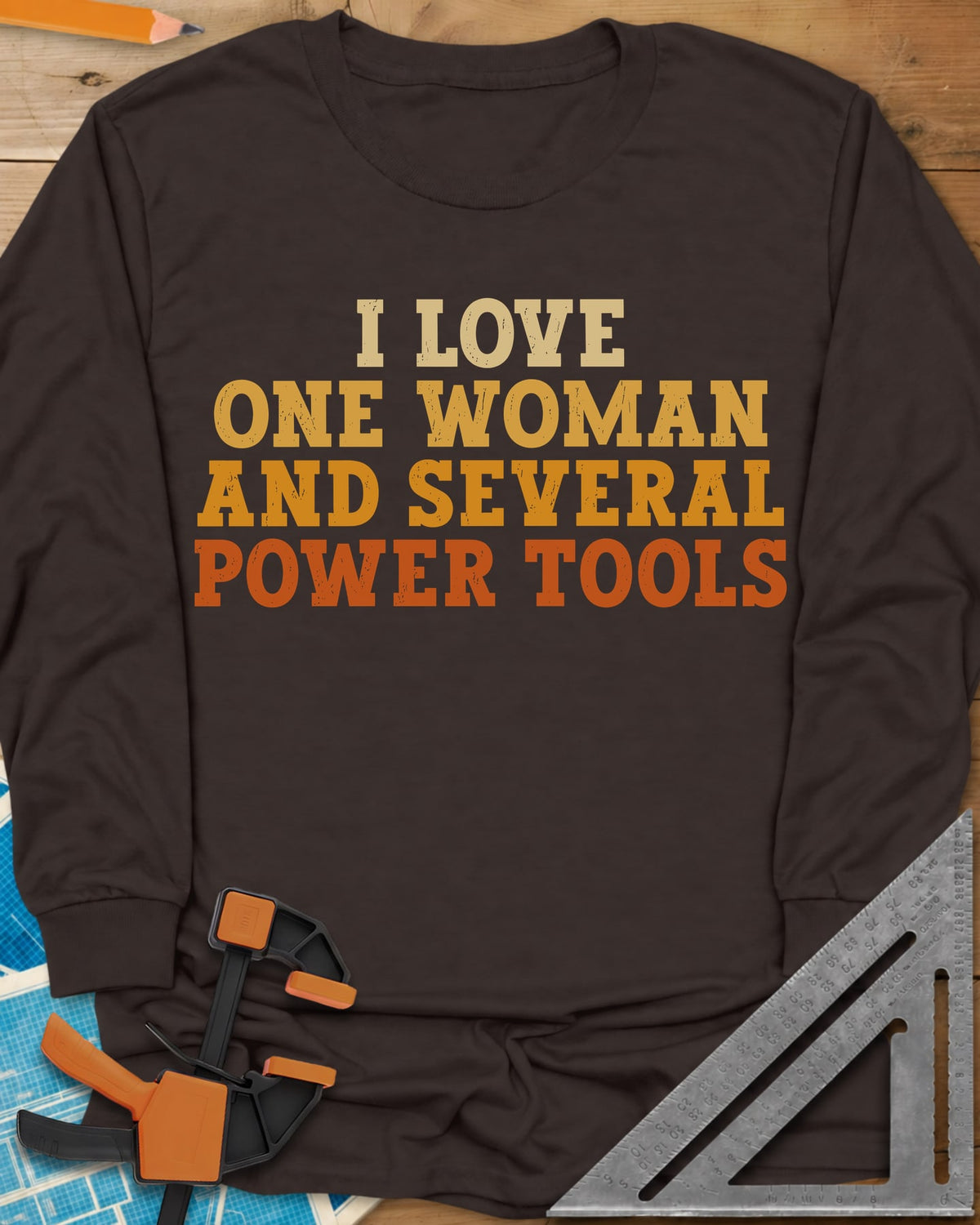 I Love One Woman And Several Power Tools long sleeve shirt in Dark Chocolate, four stacked lines of slab-serif type fading