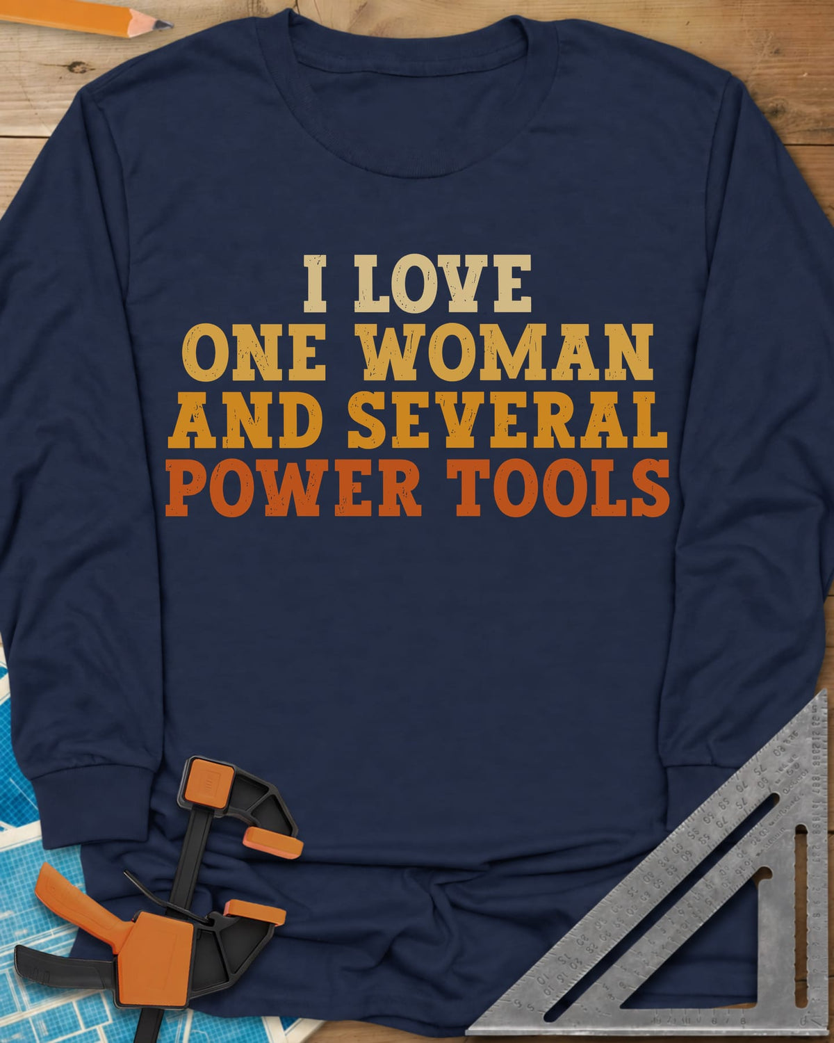 I Love One Woman And Several Power Tools long sleeve shirt in Navy, four stacked lines of slab-serif type fading from cream