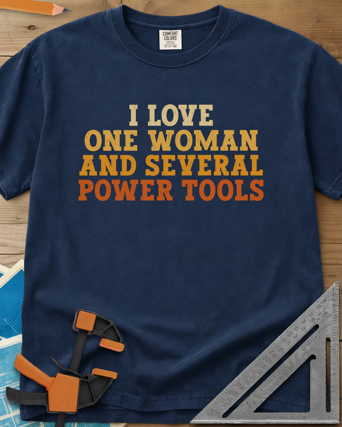 I Love One Woman And Several Power Tools heavyweight tee in Navy, four stacked lines of slab-serif type fading from cream to