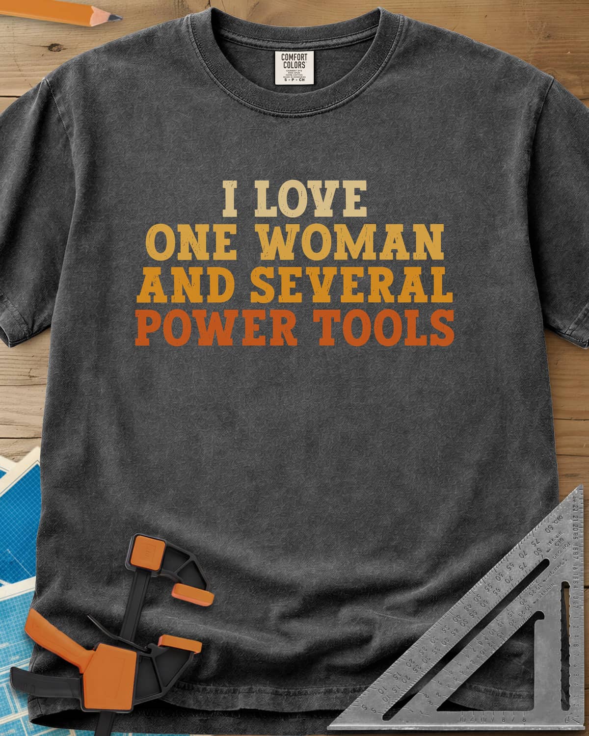 I Love One Woman And Several Power Tools heavyweight tee in Pepper, four stacked lines of slab-serif type fading from cream