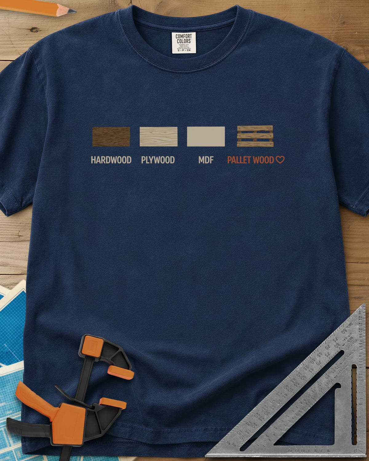 I Love Pallet Wood heavyweight tee in Navy, four wood swatches labeled hardwood, plywood, MDF and pallet wood