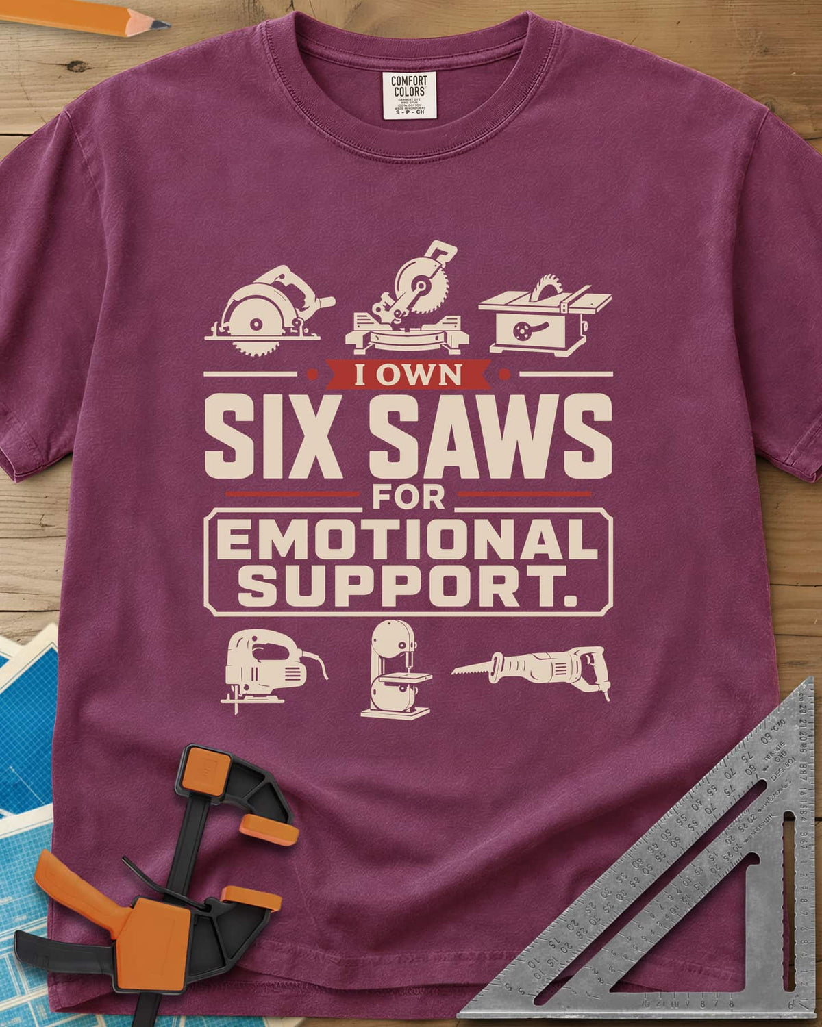 I Own Six Saws For Emotional Support heavyweight tee in Berry, six saw icons around the words, circular saw to band saw