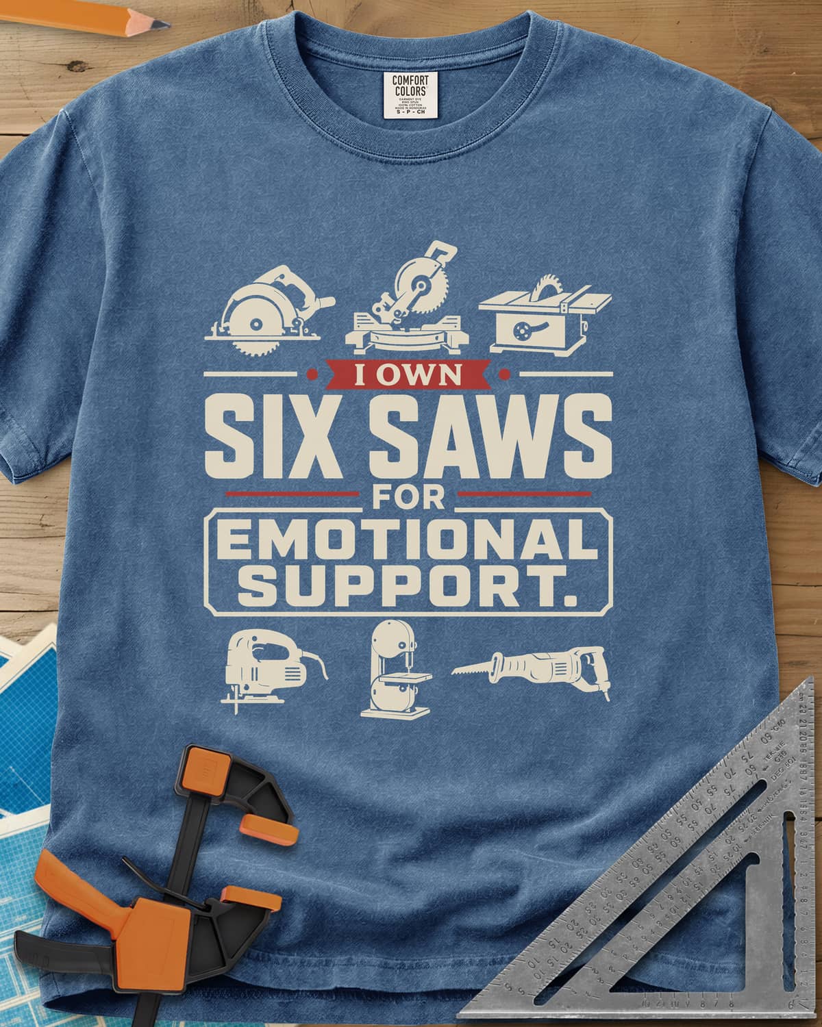 I Own Six Saws For Emotional Support heavyweight tee in Blue Jean, six saw icons around the words, circular saw to band saw