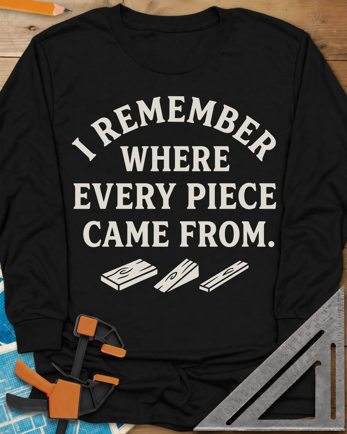 I Remember Where Every Piece Came From long sleeve shirt in Black, arched lettering above three small boards with swirled