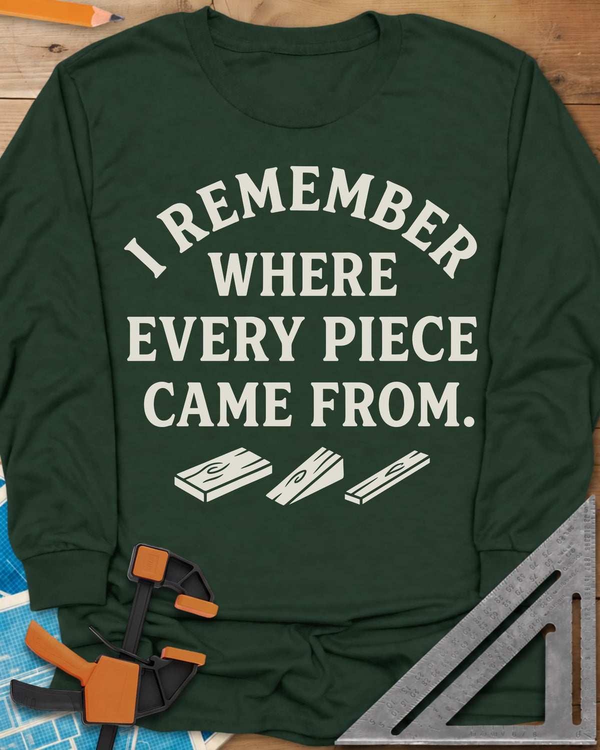 I Remember Where Every Piece Came From long sleeve shirt in Forest Green, arched lettering above three small boards with