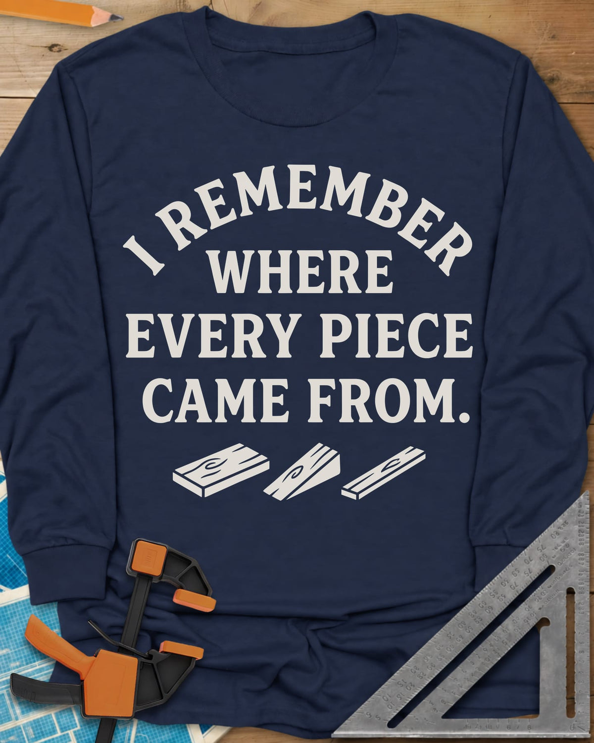 I Remember Where Every Piece Came From long sleeve shirt in Navy, arched lettering above three small boards with swirled