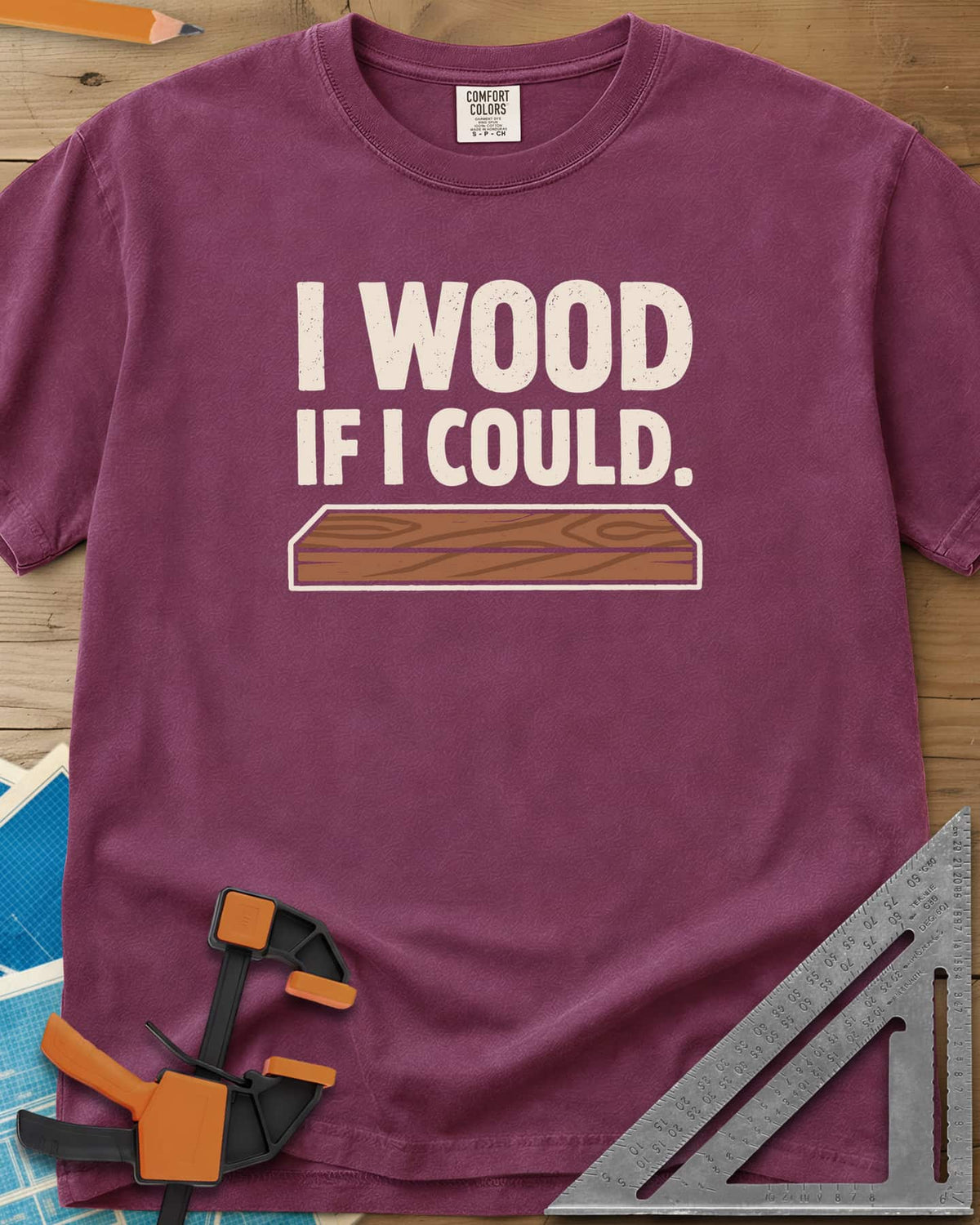 I Wood If I Could heavyweight tee in Berry, distressed lettering above a drawn wood plank with grain
