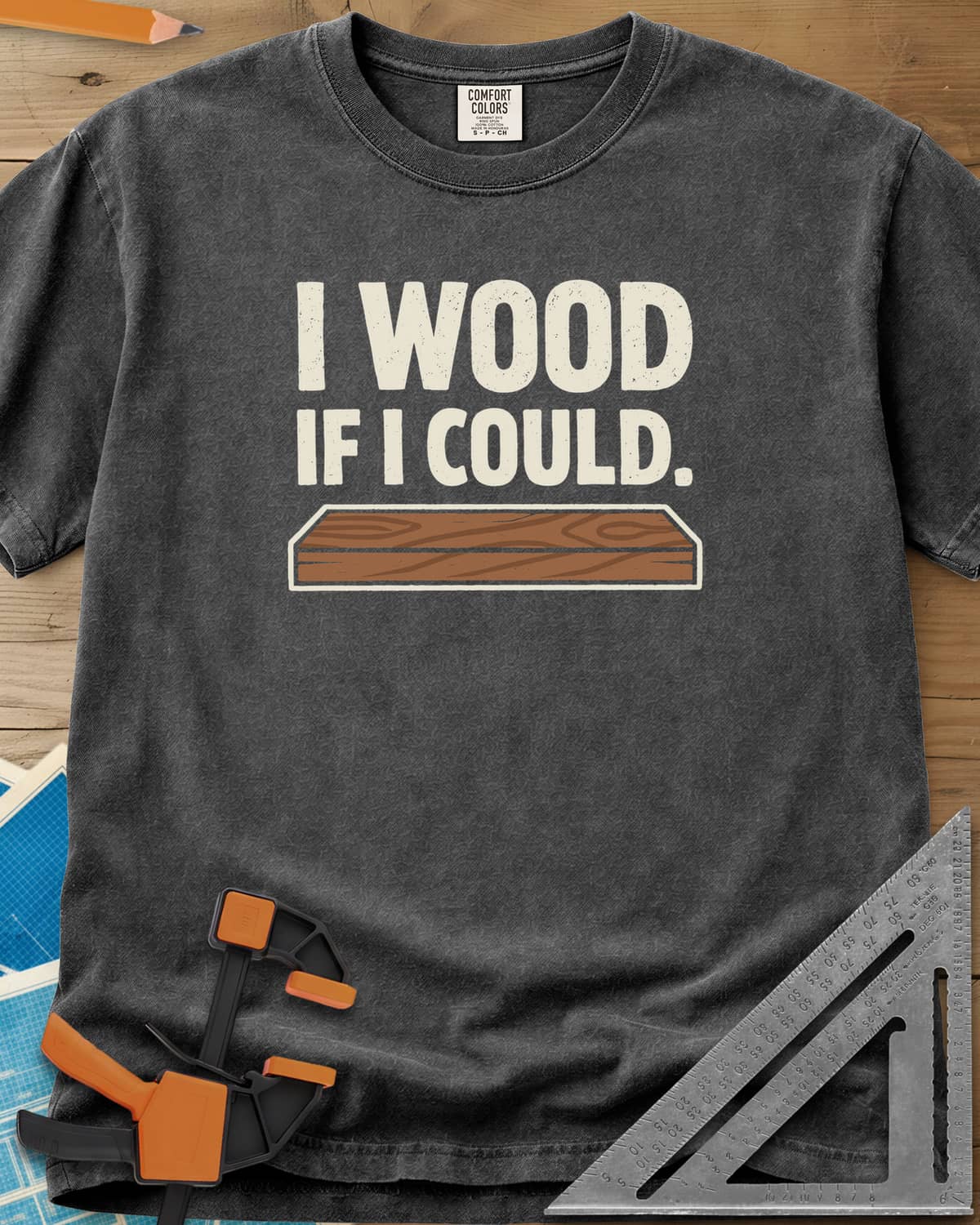 I Wood If I Could heavyweight tee in Pepper, distressed lettering above a drawn wood plank with grain