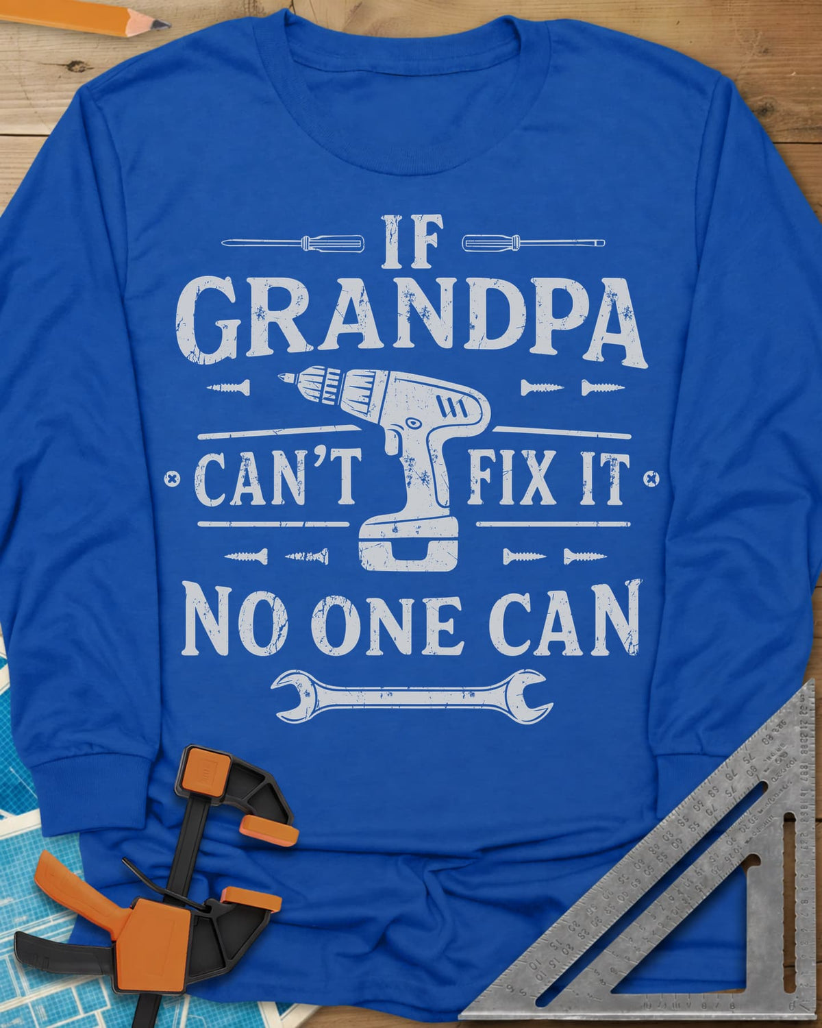 If Grandpa Can't Fix It No One Can long sleeve shirt in Royal, distressed lettering around a cordless drill, screws and a