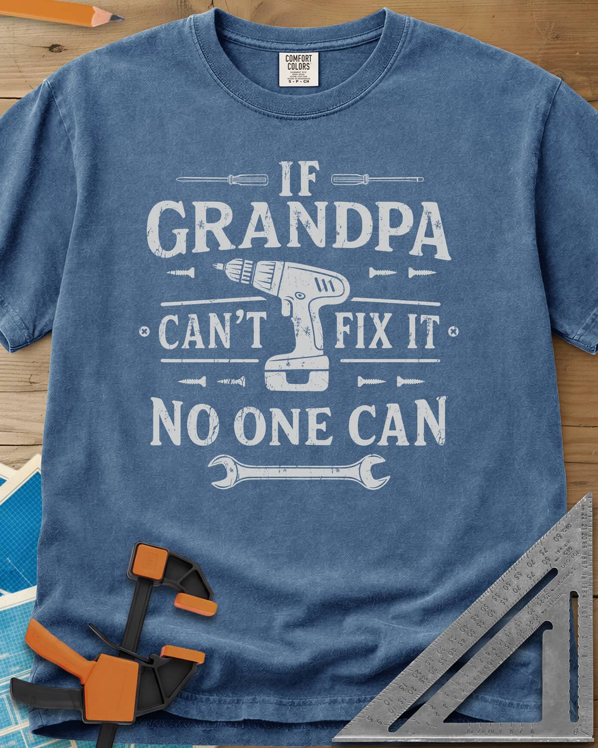 If Grandpa Can't Fix It No One Can heavyweight tee in Blue Jean, distressed lettering around a cordless drill, screws and a