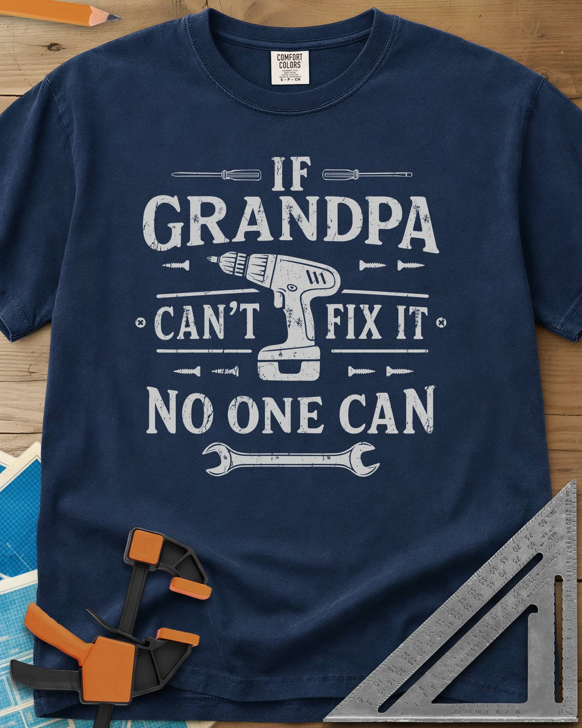 If Grandpa Can't Fix It No One Can heavyweight tee in Navy, distressed lettering around a cordless drill, screws and a wrench