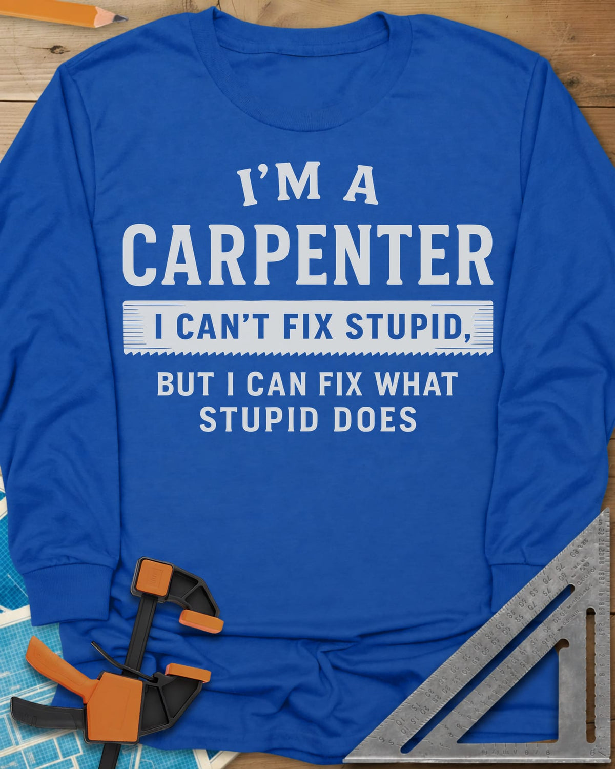 I’m a Carpenter long sleeve shirt in Royal, block lettering with a saw-tooth strip behind the middle line